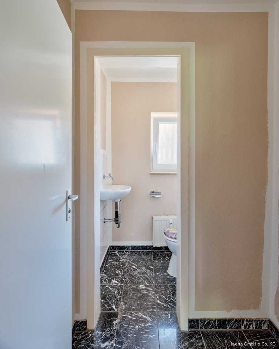 WC OG Mehrfamilienhaus Urbach